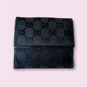 Gucci black monogram bi fold wallet.
